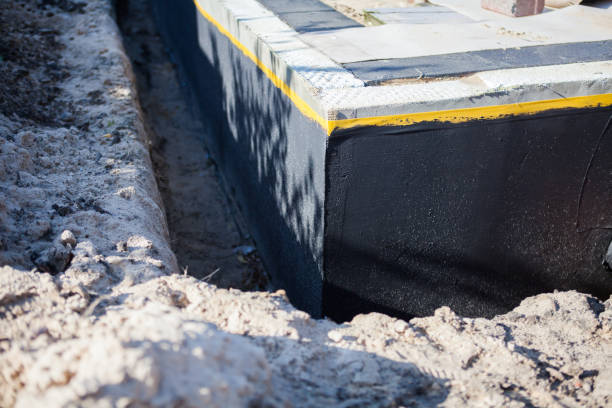 Professional Emergency Waterproofing technician working in Amherst Junction, WI
